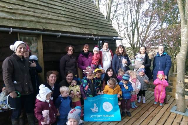 Families celebrating the great news at Forest Tots toddler group at the ECO centre. ANL-180911-092003001