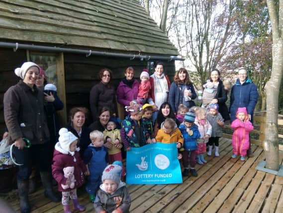 Families celebrating the great news at Forest Tots toddler group at the ECO centre. ANL-180911-092003001