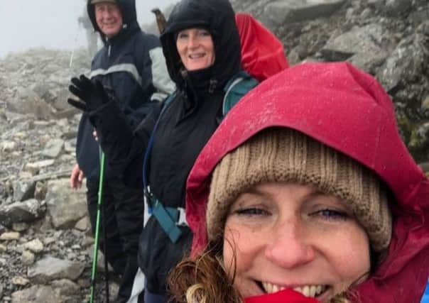 Rachel McCarthy (front) with her sister in law, Nikki Stout, and father David Ward in a snowstorm on Ben Nevis.