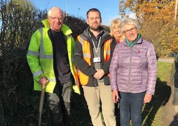Village residents Sue Tubman and Gill Bennett met with Grant White and the contractor at the phone box site