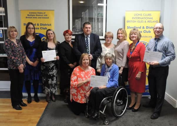 Sleaford Lioness Club with recipients of centenary awards and certificates of appreciation. EMN-181127-142903001