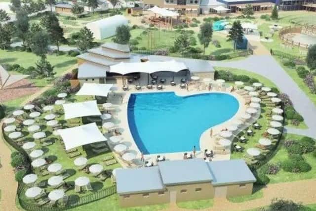 A perspective image of the outdoor pool at Tattershall Country Lakes Park. EMN-181123-100940001