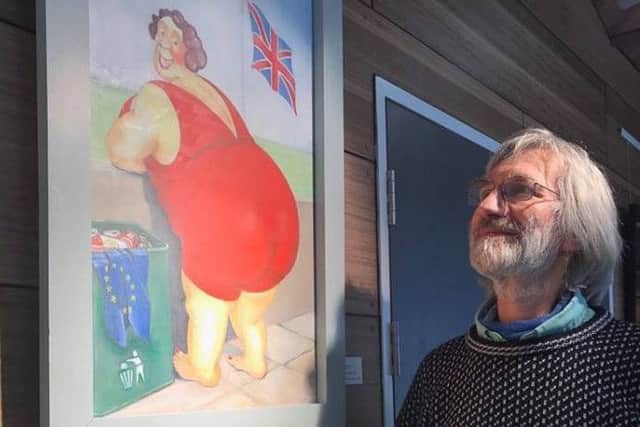 Art director Biff Vernon with a Keep Britain Tidy painting by Peter Swift, a former art teacher at The Banovallum School, Horncastle. ANL-181122-133919001