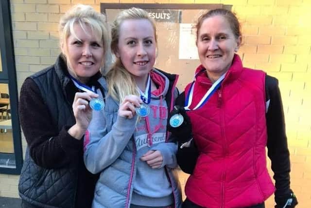 Louth AC runners - Amanda Daniels, Carlissa Daniels, Kerry Stainton (Coach) at Scunthorpe EMN-181121-163901002