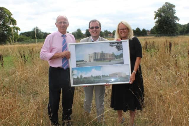Coun Summers, Coun Thomas Smith and Karen Whitfield, the Councils Leisure & Cultural Services Team Manager, with the plans. EMN-181127-110441001