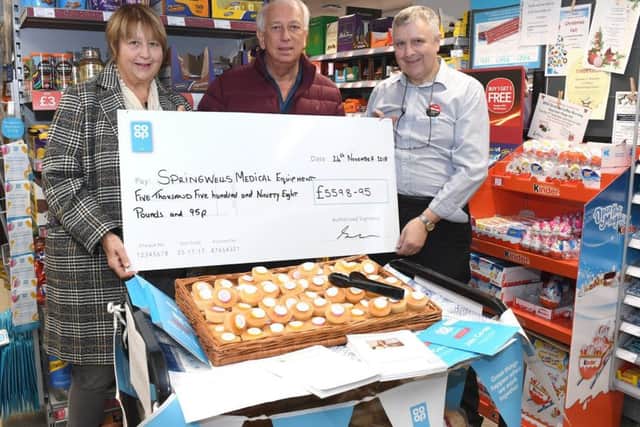 Billingborough Co-op, community funraising event. L-R Christine Espinosa - vice chair, Graham Eames - chairman, Robert Taylor - manager of Billingborough Co-op. EMN-181126-093321001