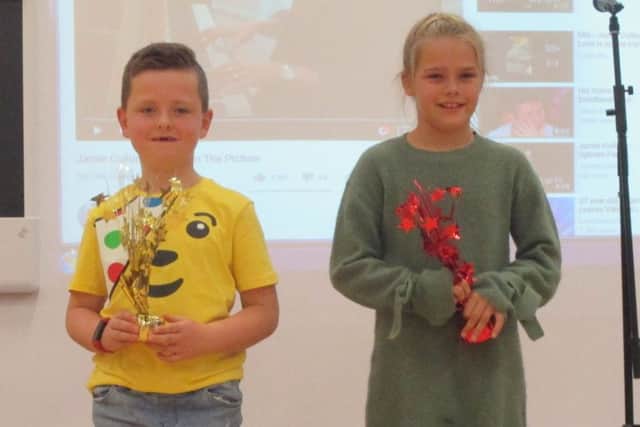 The winners of the Beacon Primary Academy talent extravaganza - Oscar (KS1) and Lexi . ANL-181123-172038001