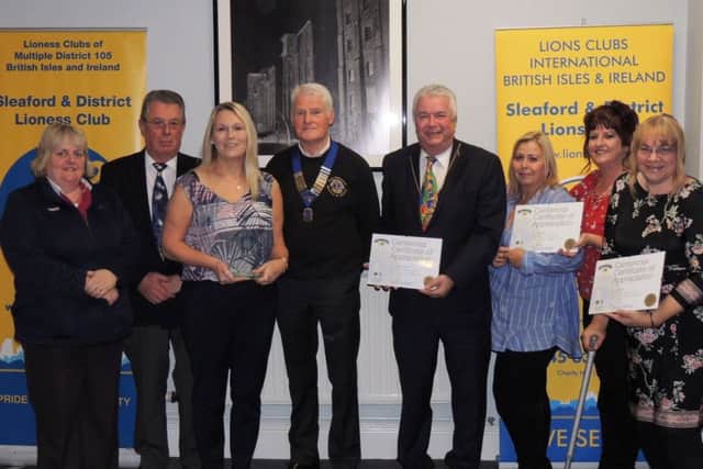 Sleaford Lions Club with recipients of centenary awards and certificates of appreciation. EMN-181127-142914001