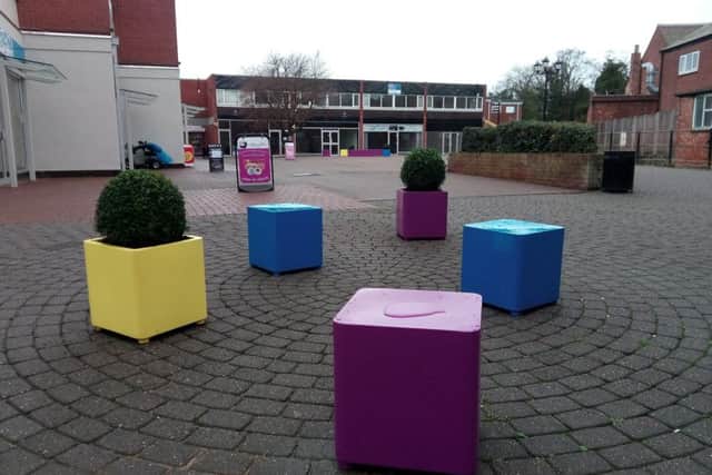 Seating and planters in Riverside Precinct. EMN-181128-183613001