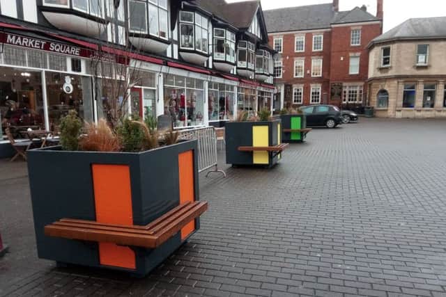 Seating and planters in Market Place, Sleaford. EMN-181128-183645001