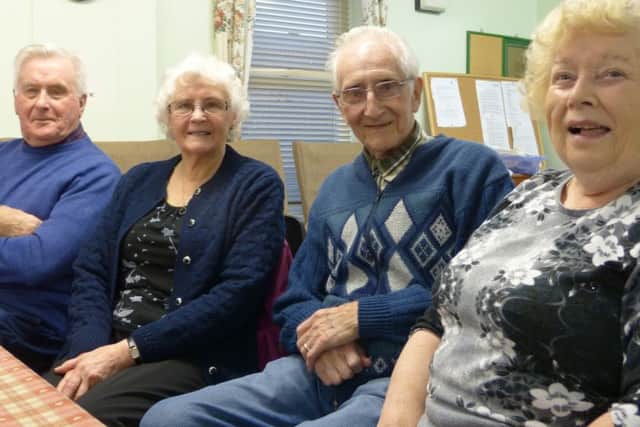 Happily married for the second time round are Bertha and Roy Mills (centre), with lunch club friends Pat Ford and Ray Crick.