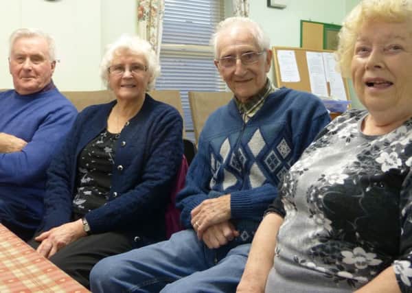 Happily married for the second time round are Bertha and Roy Mills (centre), with lunch club friends Pat Ford and Ray Crick.