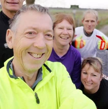 Robin (front) celebrates day 365 with pals Becky Lee, Sarah Smith, Phil Horton and Peter Ward.