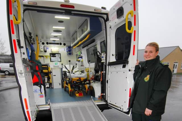 Urgent Care Assistant Hannah craig with one of the new non-urgent ambulances now in service based at Sleaford. EMN-181112-145819001