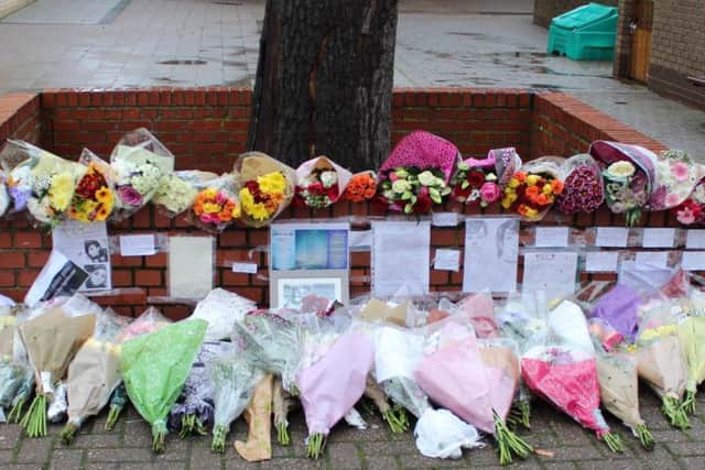 Some of the floral tributes left at St George's Academy in Sleaford to Eliza Bill.