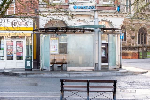 The bus stop in the towns Market Place.