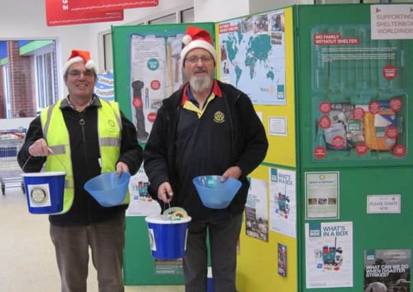 Rotarians out collecting last year EMN-181217-123514001