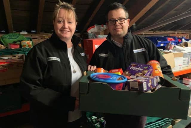 Grunwald/Langguth UK directors Samantha Smith and James Causebrook at the Sleaford New Life Community Larder.