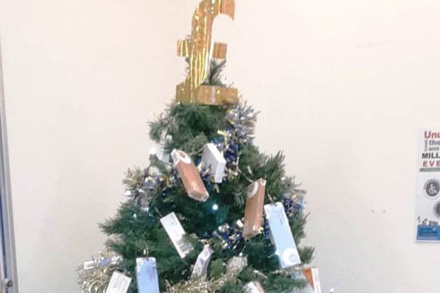 Sleaford Medical Group's tree decorated with returned medication. EMN-181221-121810001