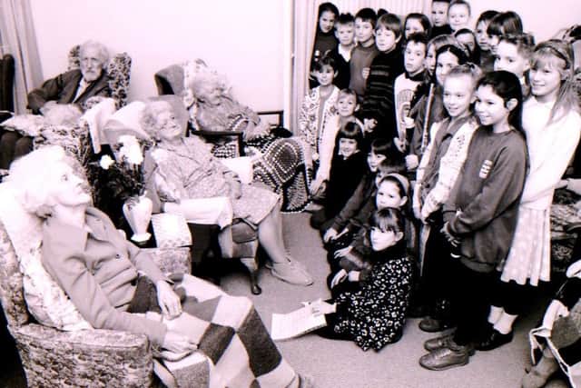 Dowsby Hall residents enjoy a visit from Pointon School pupils in 1993. EMN-181220-104739001