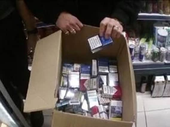 Some of the cigarettes seized by police from the Boston shop