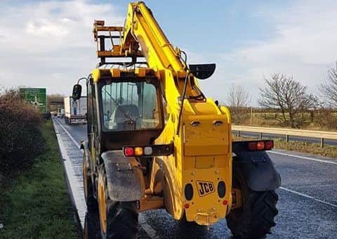 Abandoned - the JCB forklift carelessly parked on the A17 dual carriageway at Sleaford on Wednesday morning. EMN-181220-094947001