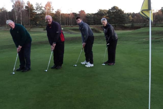 Out with the old - 2018 captains putt out their year on the 18th hole, from left, Bob Boulton (standing in for outgoing seniors' captain Jerry Buttery), Ian Ribey (men's), Mark Bedford (juniors) and Jenny Holborn (ladies). EMN-181220-100554002