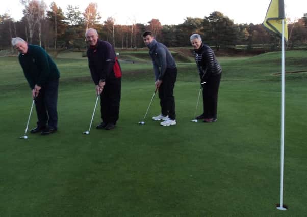 Out with the old - 2018 captains putt out their year on the 18th hole, from left, Bob Boulton (standing in for outgoing seniors' captain Jerry Buttery), Ian Ribey (men's), Mark Bedford (juniors) and Jenny Holborn (ladies). EMN-181220-100554002