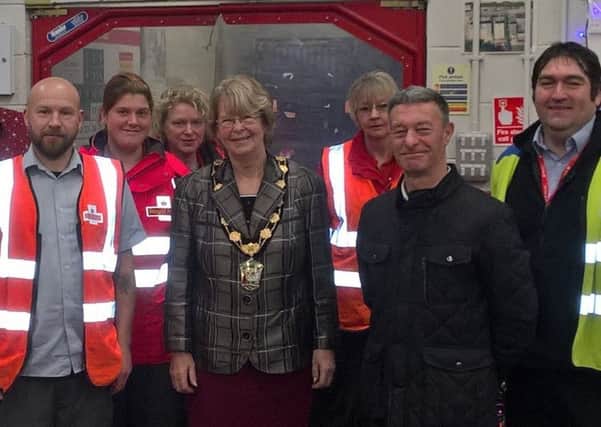 Coun Pat Mewis paid a festive visit to posties at Market Rasen delivery office EMN-181220-184318001