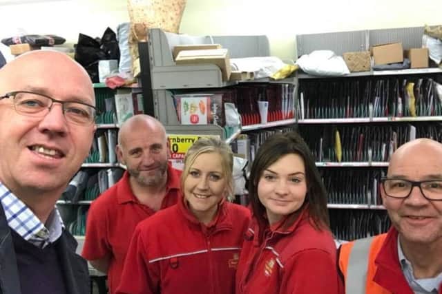 Craig Leyland with staff from Woodhall Spa Post Office. EMN-181221-155642001