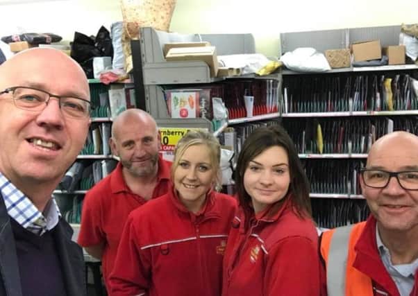 Craig Leyland with staff from Woodhall Spa Post Office. EMN-181221-155642001