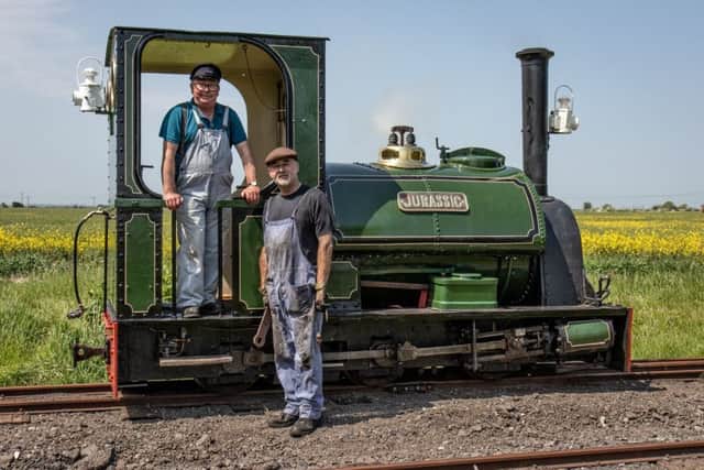 This picture by  Dave EnNefer shows  Jurassic with driver Mick Allen -- a volunteer since 1960 - on the footplate and fireman Mike Gott (a volunteer for nearly as long) preparing to couple up the loco to her train at South Loop ready for the run back to Walls Lane. ANL-181227-142728001