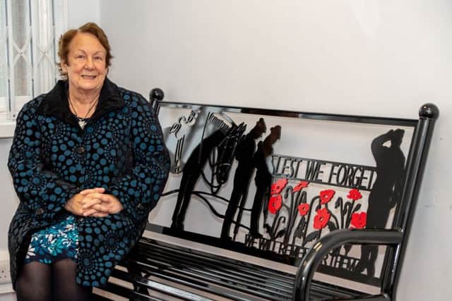 Town and district  councillor Fiona Martin sits on the new bench