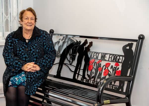 Town and district  councillor Fiona Martin sits on the new bench