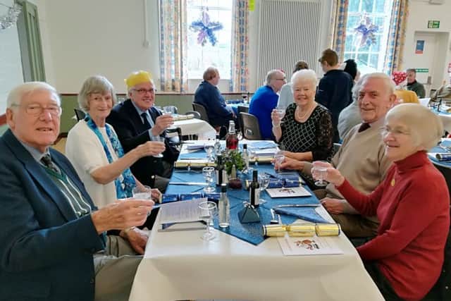 Cheers - guests at the lunch held at the Community Centre EMN-181227-154207001