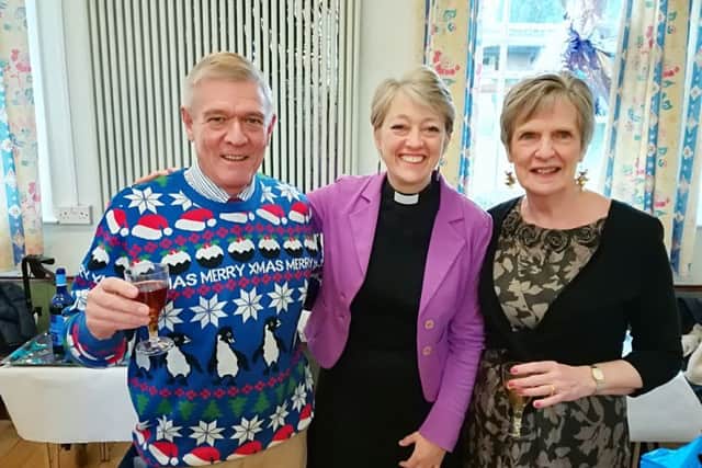 The Rev Samantha Parsons (centre) with Anne and Jonnie Duncan, two of the Christmas Lunch volunteers EMN-181227-153510001