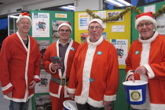 Santa shift change at Caistor: - Jo Bowman, Hugh Nott, Tony Maund and David Mason. EMN-181231-065816001