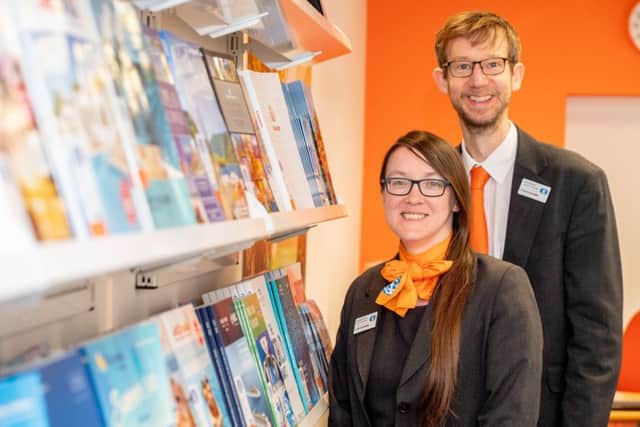 One of the Co-ops Travel Managers Lisette Barnes and Assistant Manager Paul Newton. Picture: John Aron,