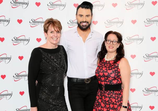 Slimming World consultants Sue Woodford and Pam Cole meet singer and presenter Rylan Clark-Neal. EMN-181231-152842001