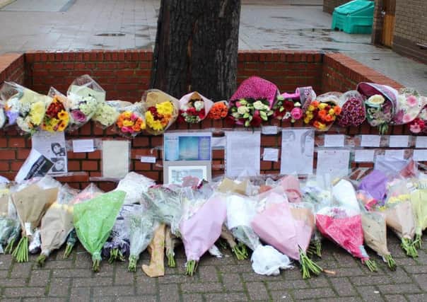 Some of the floral tributes left at St George's Academy in Sleaford to Eliza Bill.