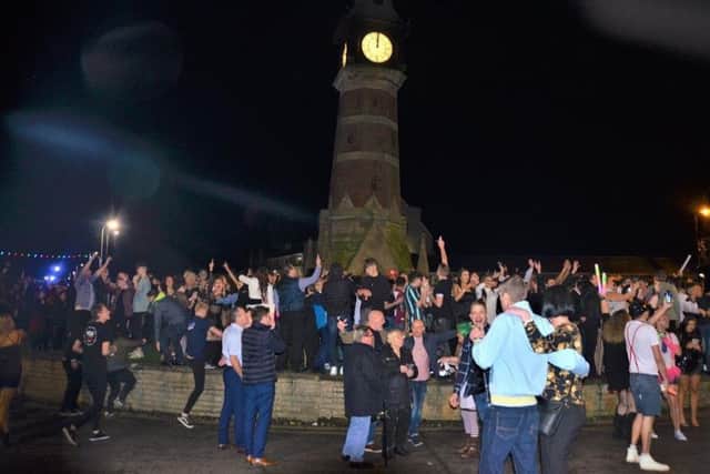 Crowds welcoming in the New Year in Skegness. Photo: Barry Robinson. ANL-190101-081049001