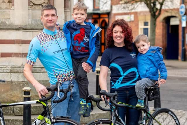 Wheels of fortune: Husband and wife Nick and Kelly Mowbray with children Jacob (5) and George (3). Picture: John Aron.