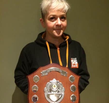 Jen Stainton with her award from the Scottish Sidecar Racing Club EMN-190301-145129002