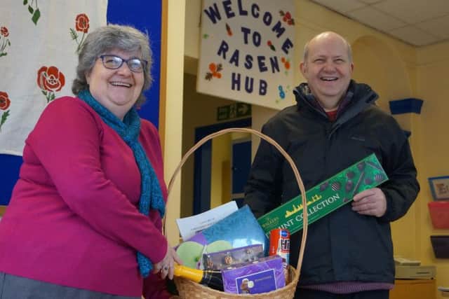 Graham Weller receives his prize from Rasen Hub director Caroline Foster EMN-191101-114636001