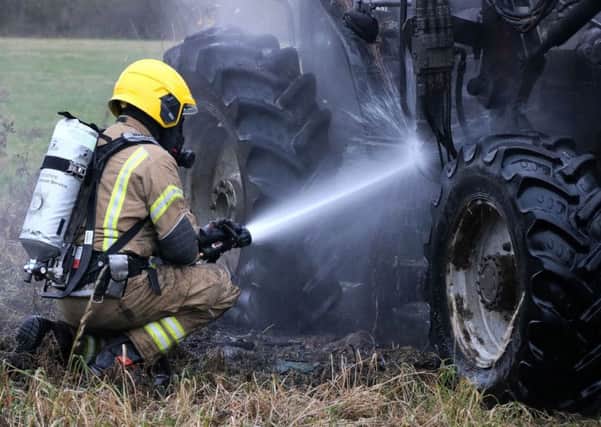 Firefighters attended a tractor fire near Woodhall Spa. Picture: Mike Woodward - MotoAero Photography. EMN-190401-102829001