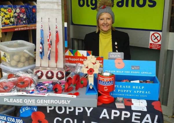 It's a new record - the Spilsby and District Branch of the Royal British Legion is celebrating a record Poppy Appeal in 2018 (following on from a record 2017). Ann Lenton, pictured, helped at both of them.