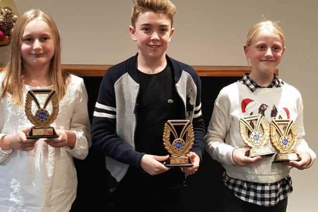 Junior award winners Lottie, Connor and Olivia EMN-190701-173126002