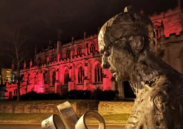 St James' Church, Louth, was lit up red over the New Year to raise awareness for mental health. (Photo: Tanya Kuzemczak).