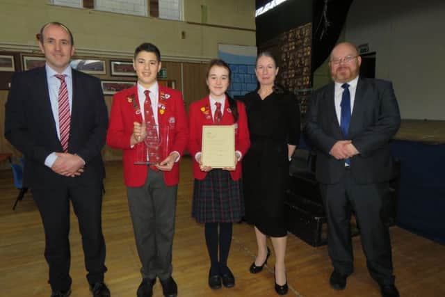 Laura Kearney, from Osiris Educational, with representatives from St Hugh's School.