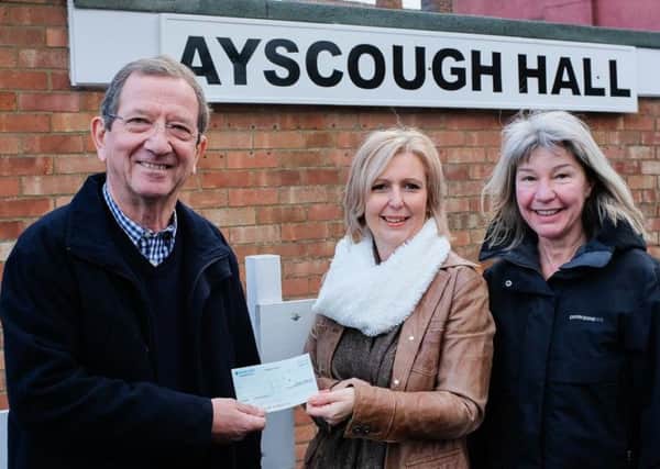 Peter Mountain (Chair of Ayscough Hall Trust) and Nicky Clarkson (Treasurer) receiving a cheque from Gail Brocklesby